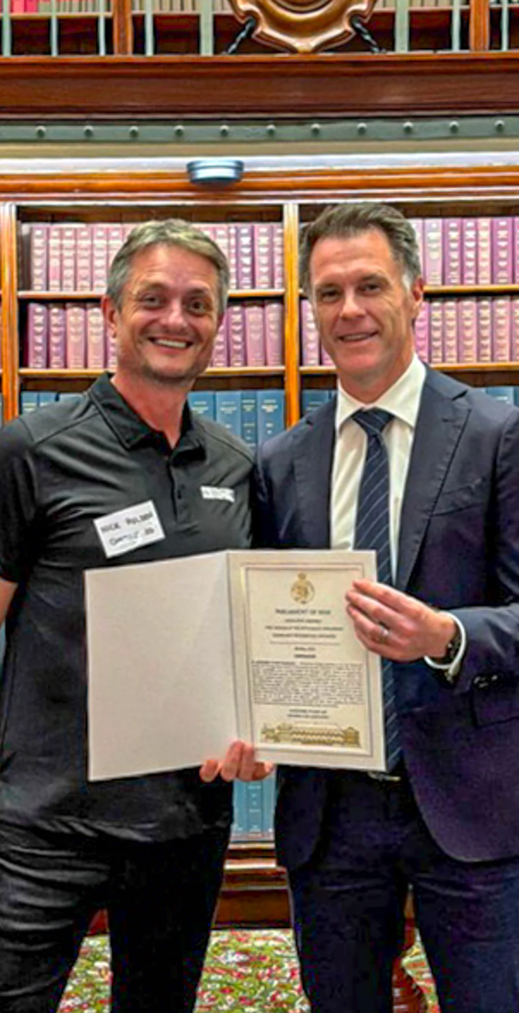 Contour3D founder Nick Holden presented with the framed NSW Legislative Assembly Hansard tribute at NSW Parliament House